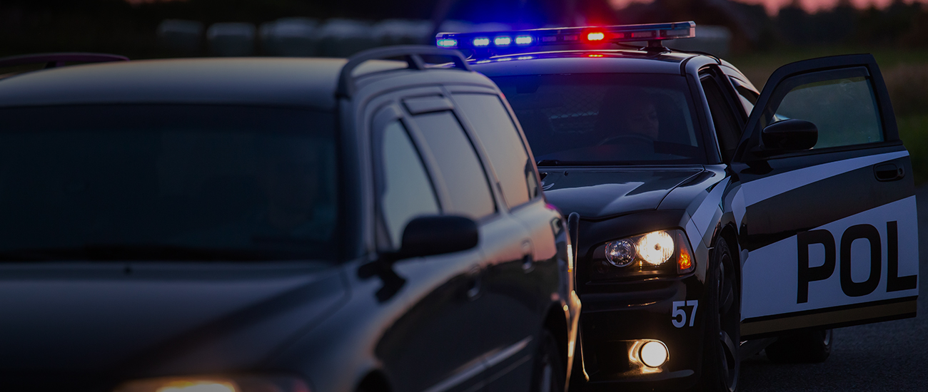 Highway Traffic Patrol Car Pulls over Vehicle on the Road